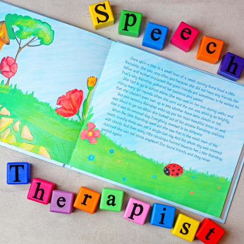 A storybook open with alphabet blocks spelling "speech therapist" surounding the book